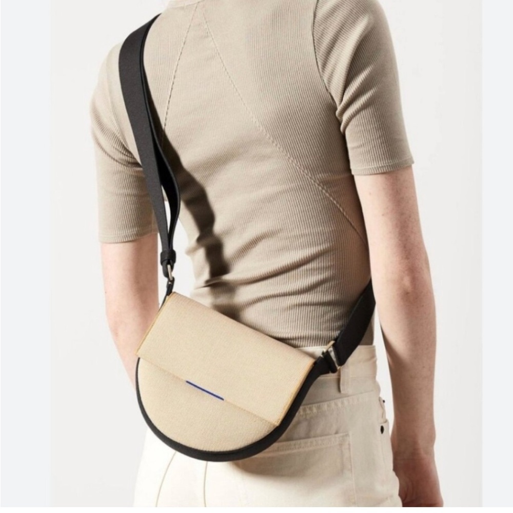 Rothy's Tan and Black Crossbody Bag with Sleek Design